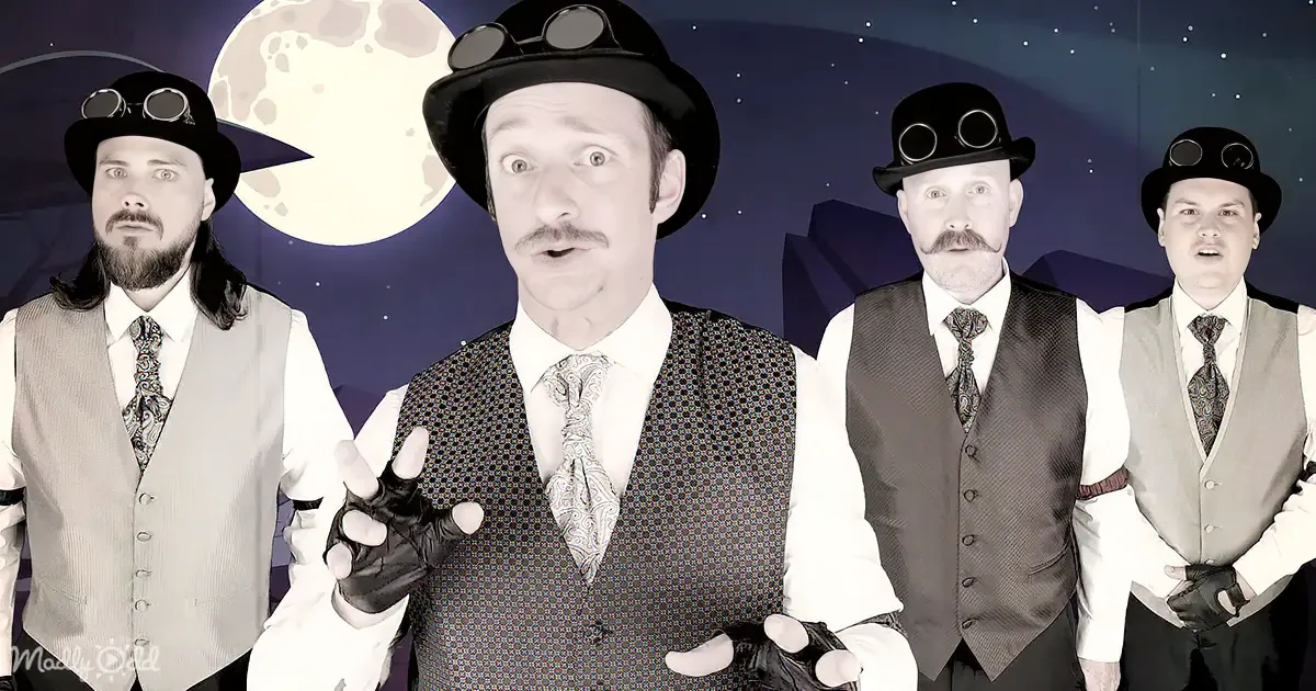 A man in a steampunk outfit with goggles and a top hat is surrounded by four identical images of himself.