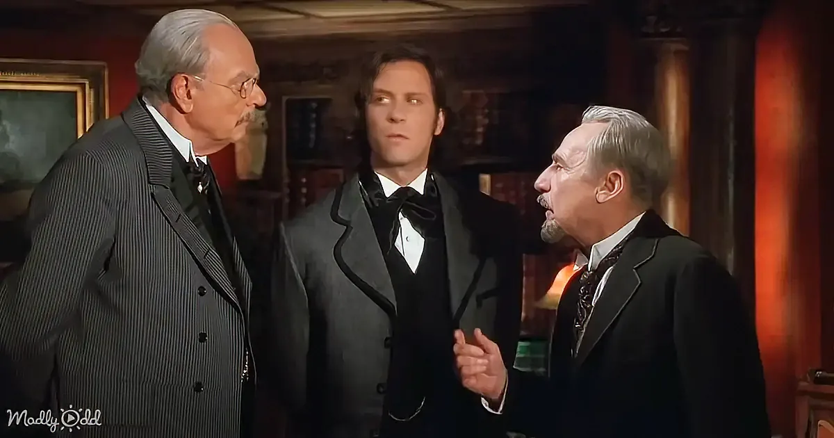 Three men in formal attire stand in a dimly lit room, engaged in a serious conversation.