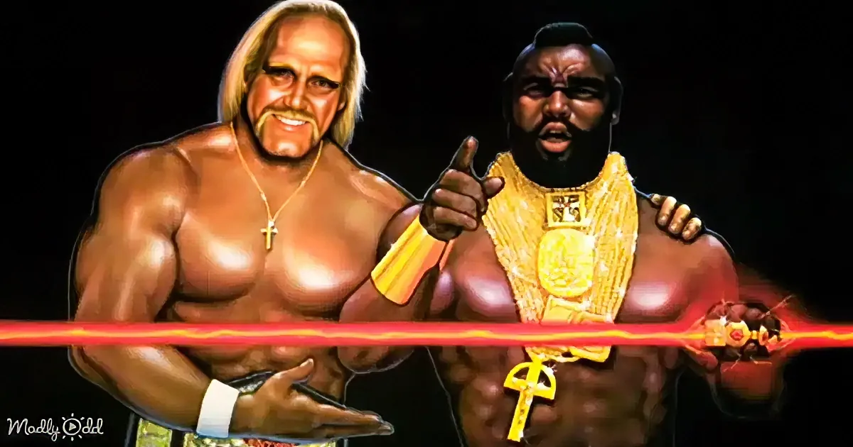 Two muscular wrestlers, one with blonde hair and a gold cross necklace, the other with a gold chain and a gold medallion...