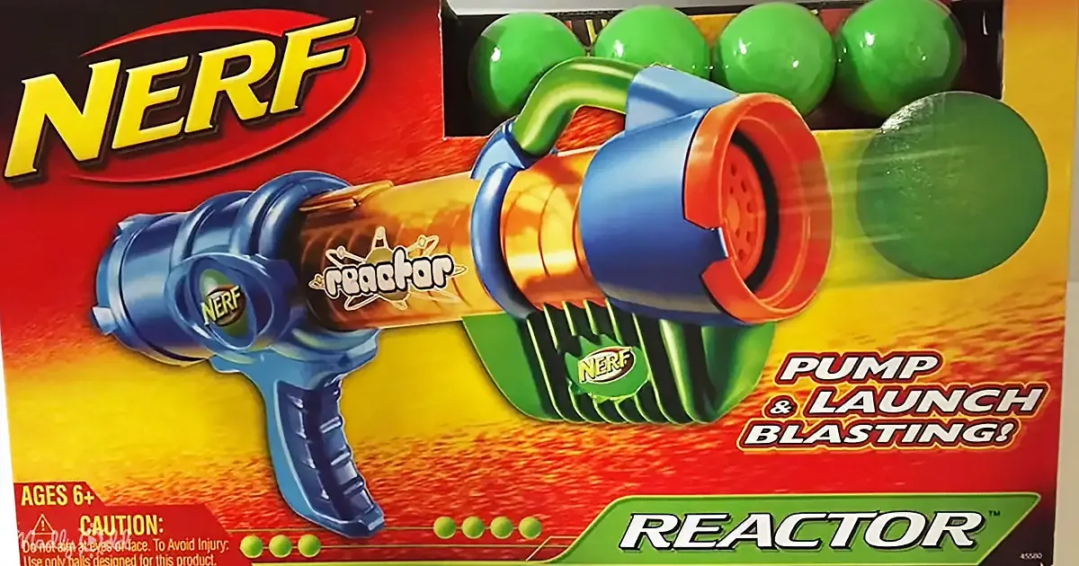 A colorful Nerf Reactor toy gun with green balls and "Pump & Launch Blasting!" text on its box.