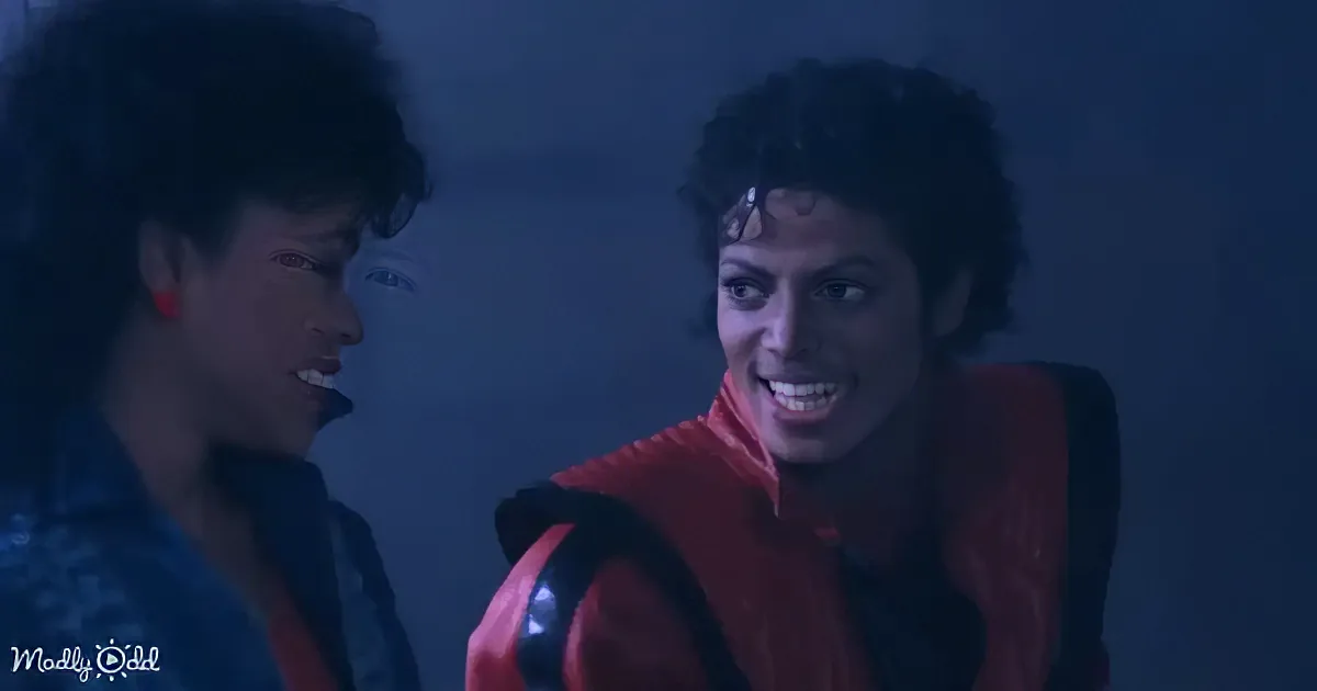 Michael Jackson in a red outfit, looking intense, with a woman in the background.