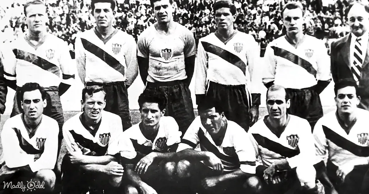 A vintage black-and-white photo of a soccer team in white jerseys with a shield emblem, posing for a group shot.