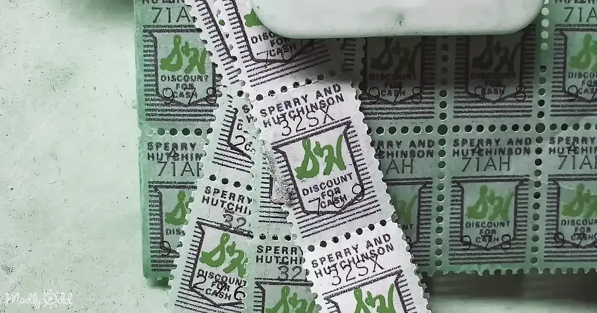 A collection of vintage discount coupons from Sperry and Hutchinson, featuring green and black designs.