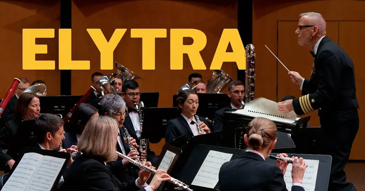 Conductor in uniform leads an orchestra with musicians playing instruments.
