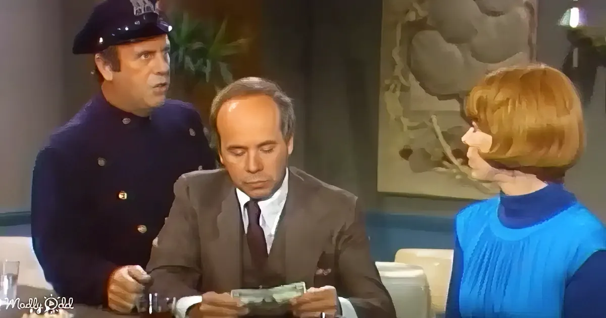 A man in a suit holds money, flanked by a police officer and a woman in a blue dress.
