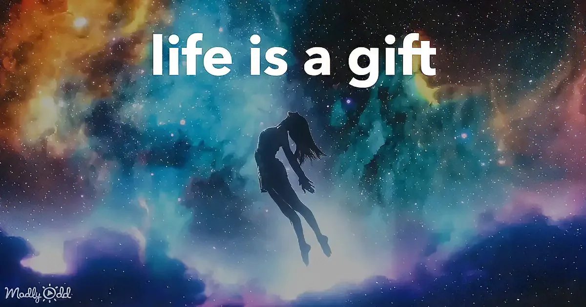 A silhouette of a person floating in a cosmic, starry sky with the text "life is a gift" above.
