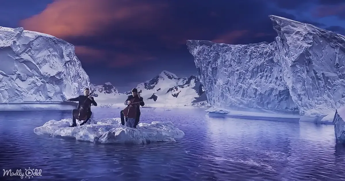 Two musicians play on icebergs in a serene, icy landscape with dramatic skies.