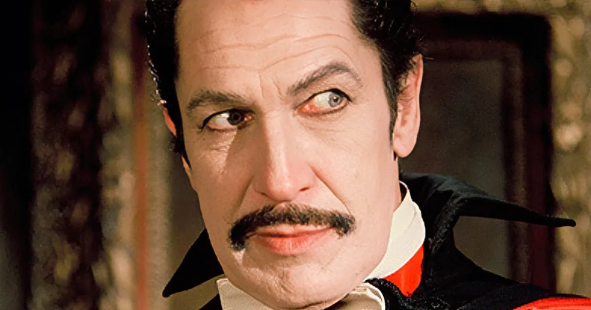 A man with a mustache and a dramatic expression, wearing a black and red outfit, is the main subject of the image.