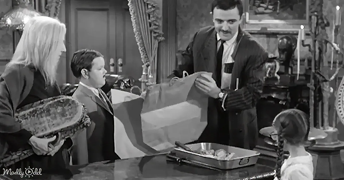 A man in a suit holds a large paper bag while a woman and a child look on, in a vintage setting.