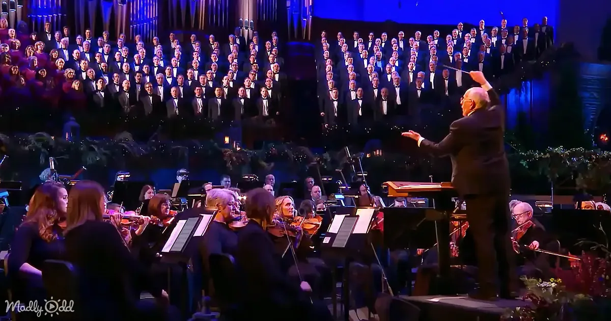 Conductor leads orchestra and choir in a grand performance.