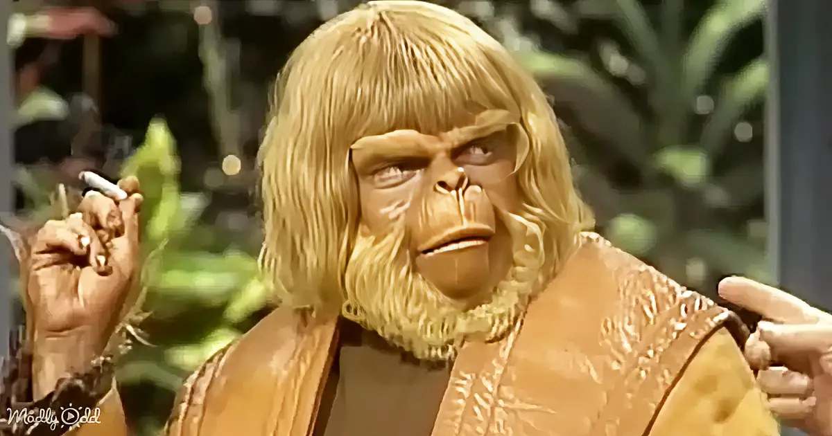A person in a monkey costume with blonde hair, smoking a cigarette, and wearing a brown outfit.
