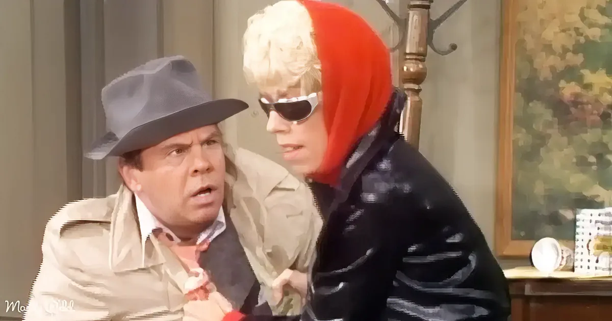 A man in a fedora and a woman in a red hat and sunglasses are interacting in a scene.