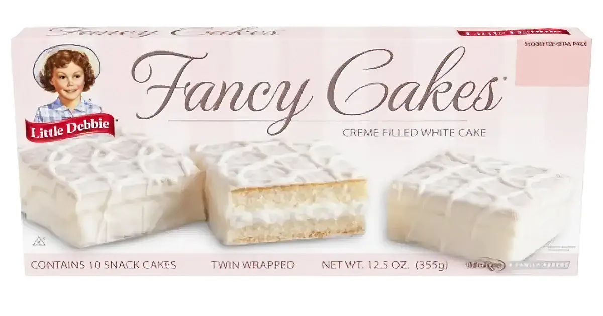 Little Debbie's Fancy Cakes box with 10 twin-wrapped white cakes, cream filling, and net weight of 12.5 oz.
