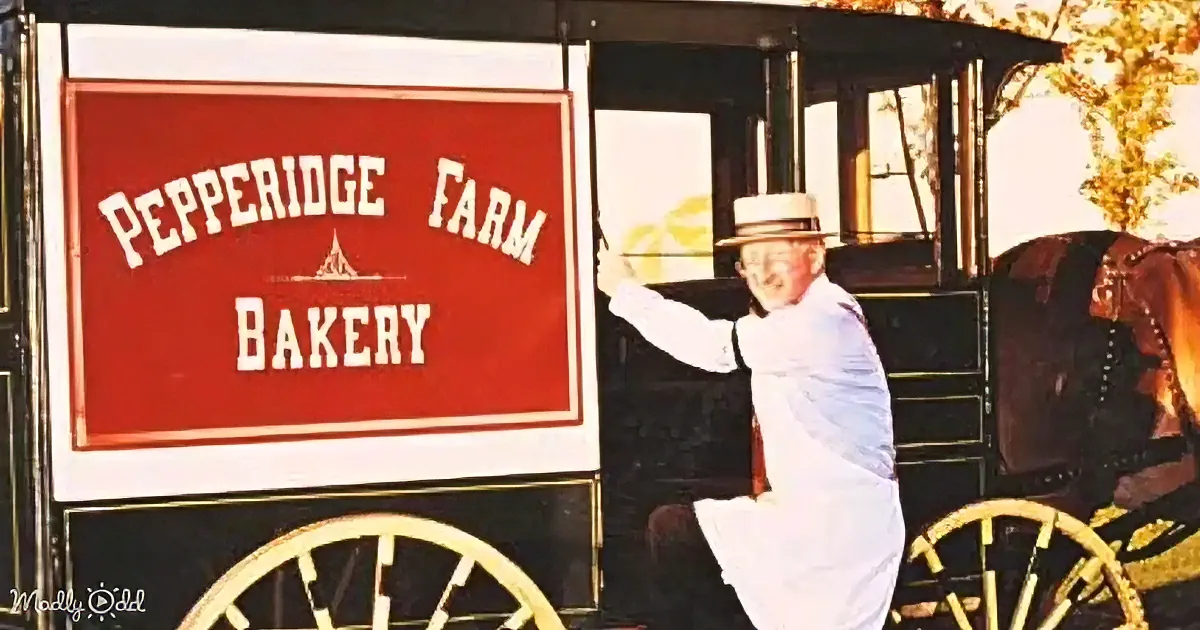 A man in a white suit leans on a vintage wagon labeled "Pepperidge Farm Bakery."