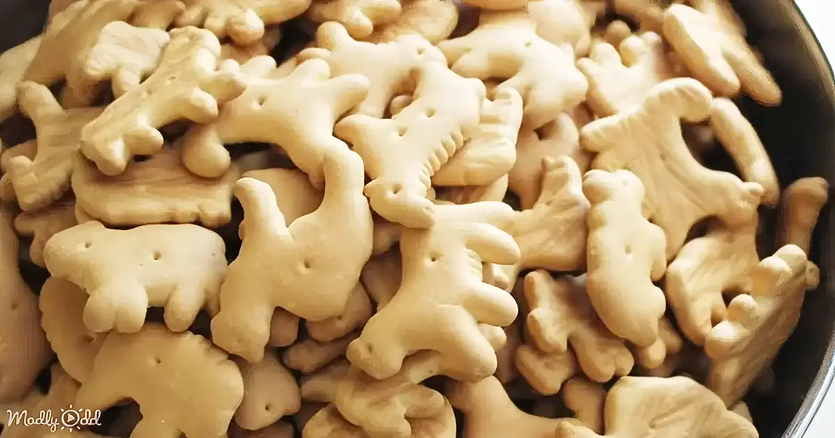 A pile of animal-shaped crackers, possibly resembling dinosaurs or other creatures.