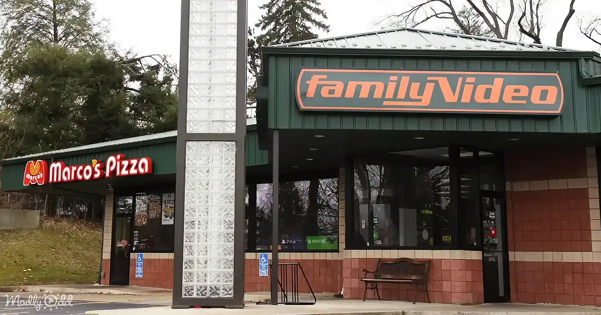 Family Video store with Marco's Pizza next door, both with distinct signs and brick facades.