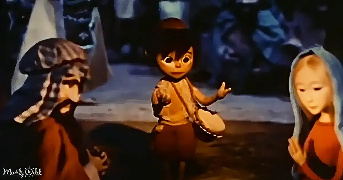A cartoon character in a brown outfit and hat is gesturing with hands, surrounded by other characters in a dimly lit setting.