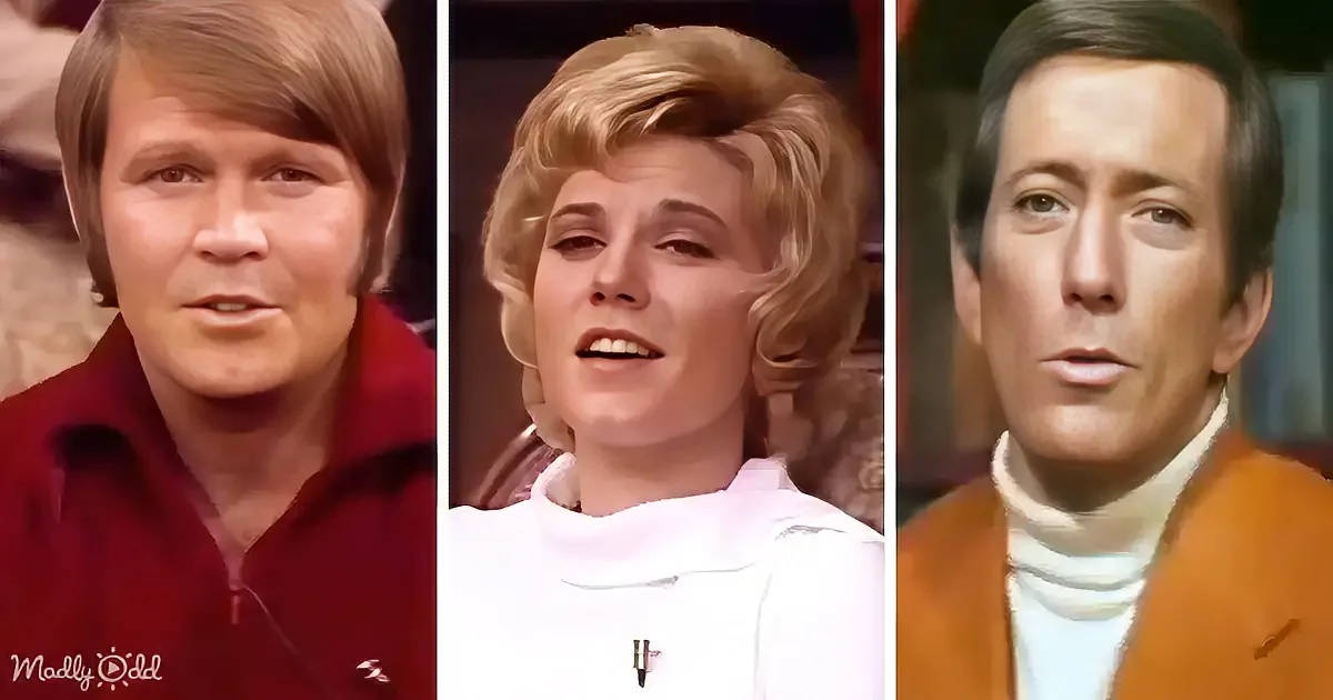 Three individuals in vintage attire, likely from a television show or movie, with distinct hairstyles and clothing styles.