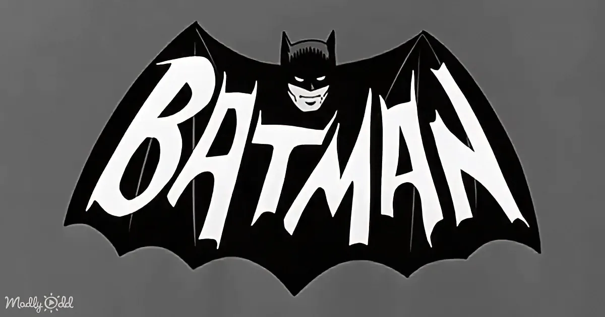 Batman logo with bat silhouette and "BATMAN" text in bold white letters against a dark background.