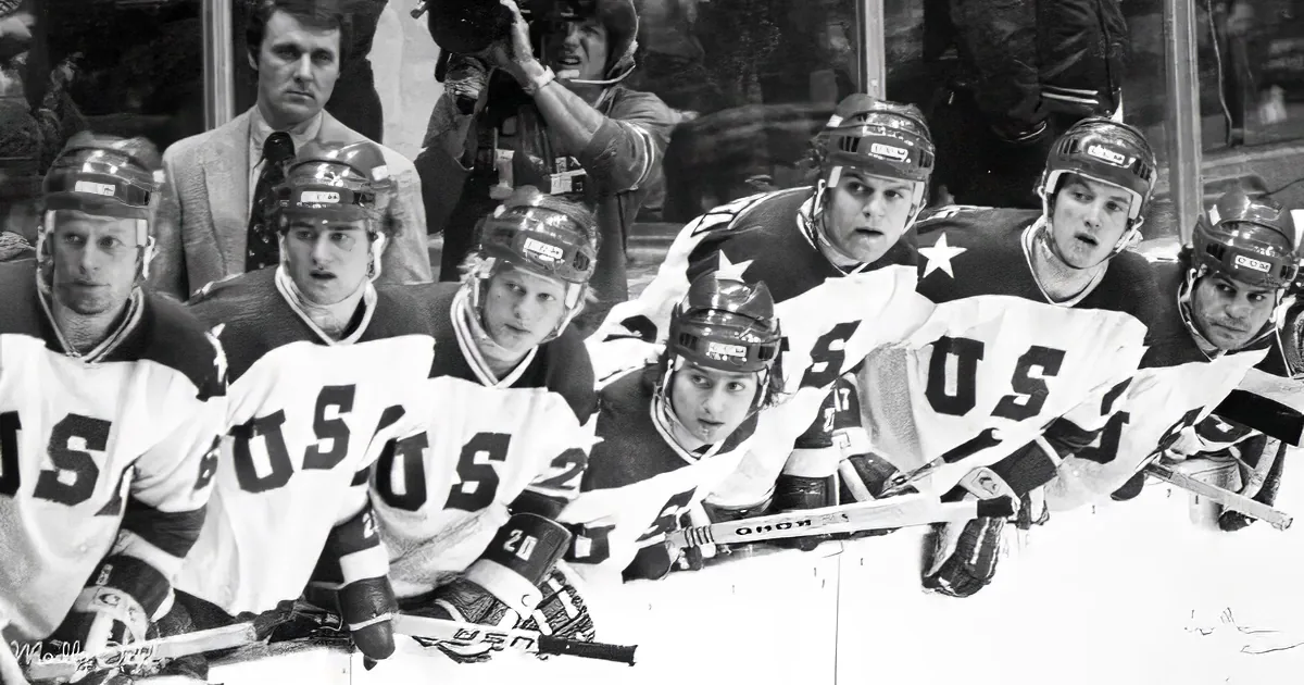 A black-and-white photo shows a group of hockey players in white jerseys with "USA" on them, lined up on the ice.