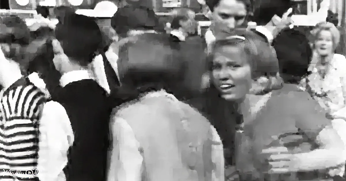 A woman in a crowd, smiling, surrounded by people in various attire.