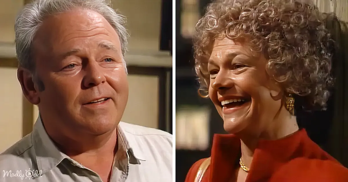 A man and a woman, both smiling, with the man wearing a light shirt and the woman in a red outfit.