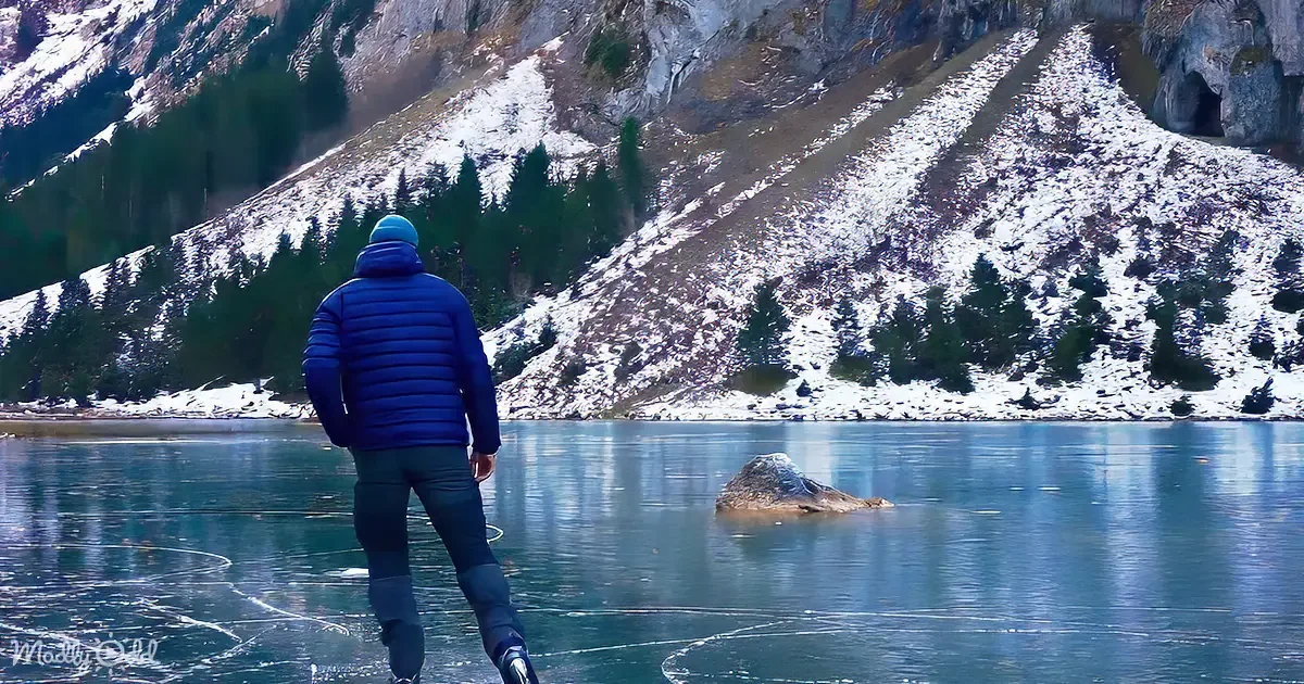 Man Ice Skating on Black Frozen Lake Is Heaven on Ice