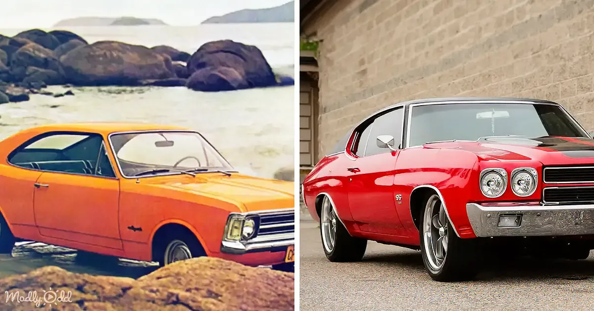 A vintage orange muscle car and a red SS muscle car are parked near a rocky beach and a brick wall, respectively.