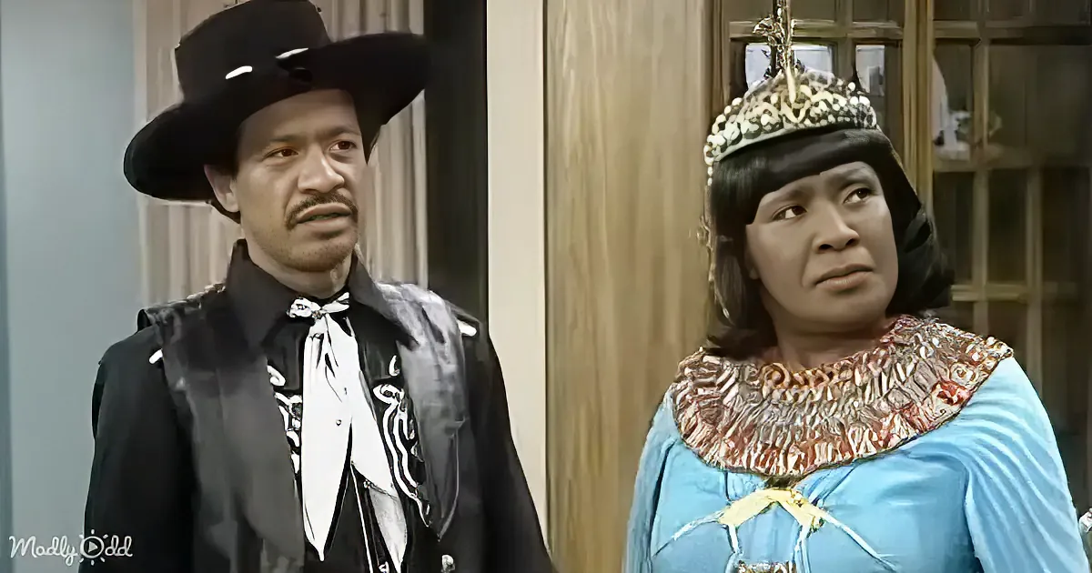 A man in a cowboy hat and a woman in a blue dress with a crown stand side by side.