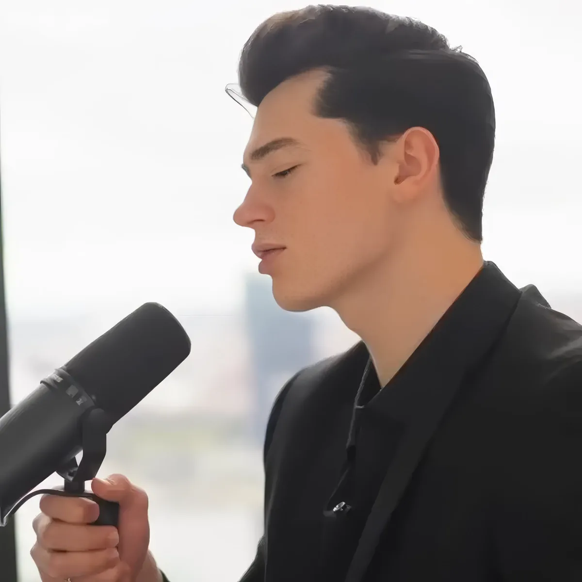 Elliot James Reay in studio singing Elvis classic.