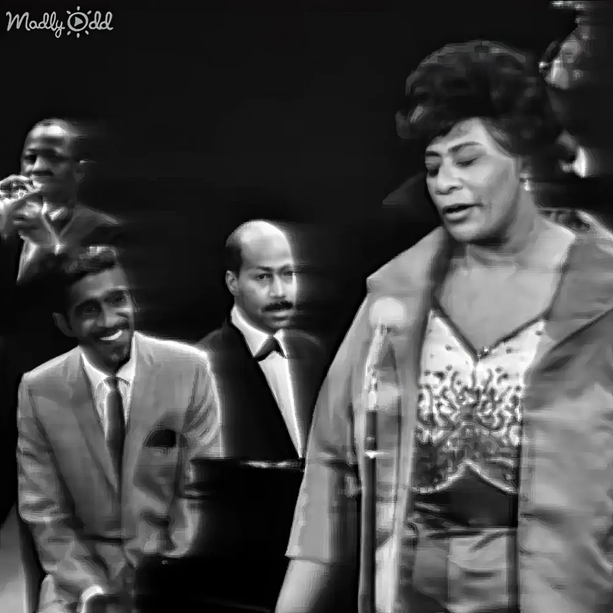 A woman sings passionately at a microphone, accompanied by musicians in a black-and-white performance.