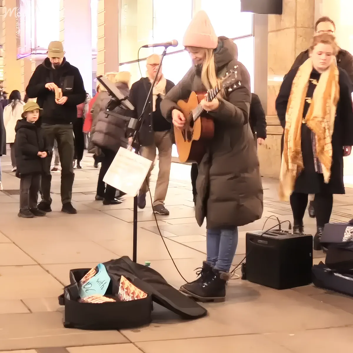 Passersby captivated by street performance