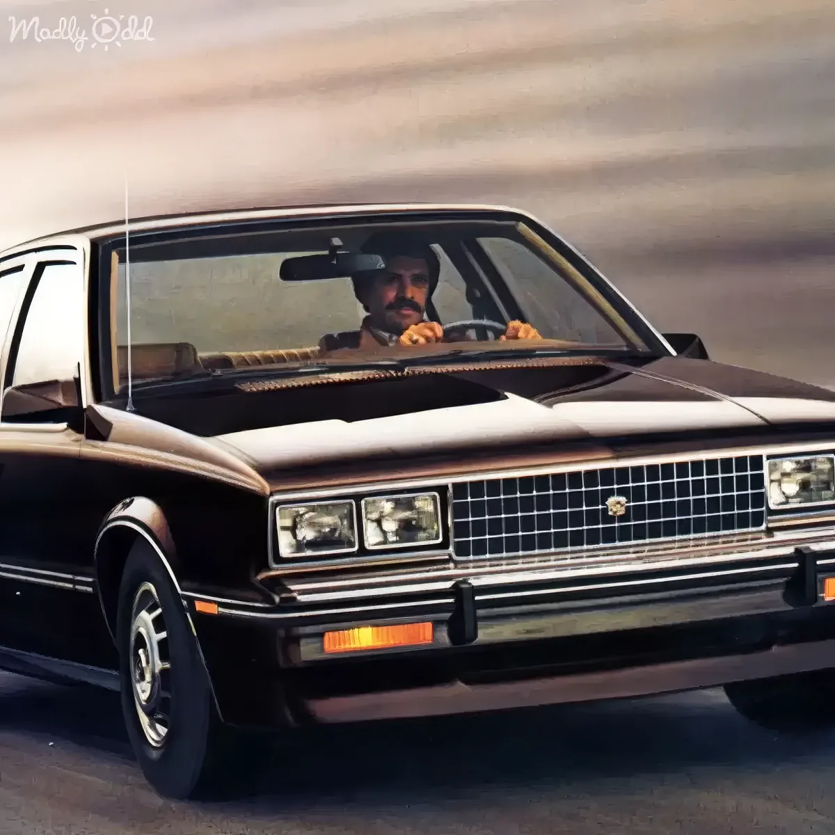 Presenter points at infamous car model in documentary