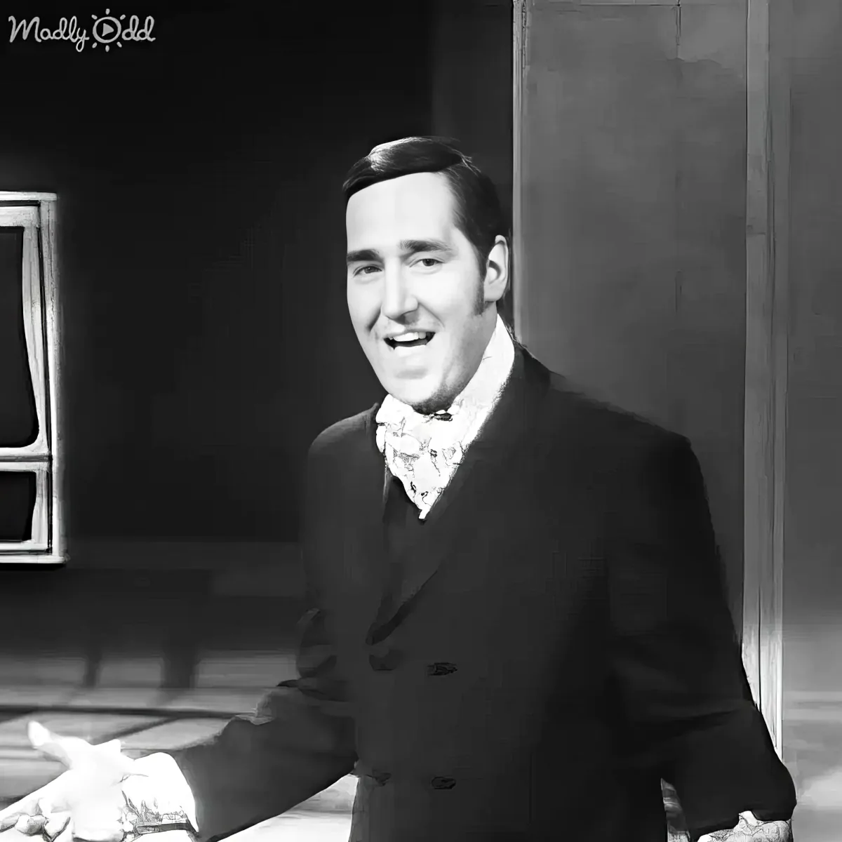 Neil Sedaka performs on stage with band