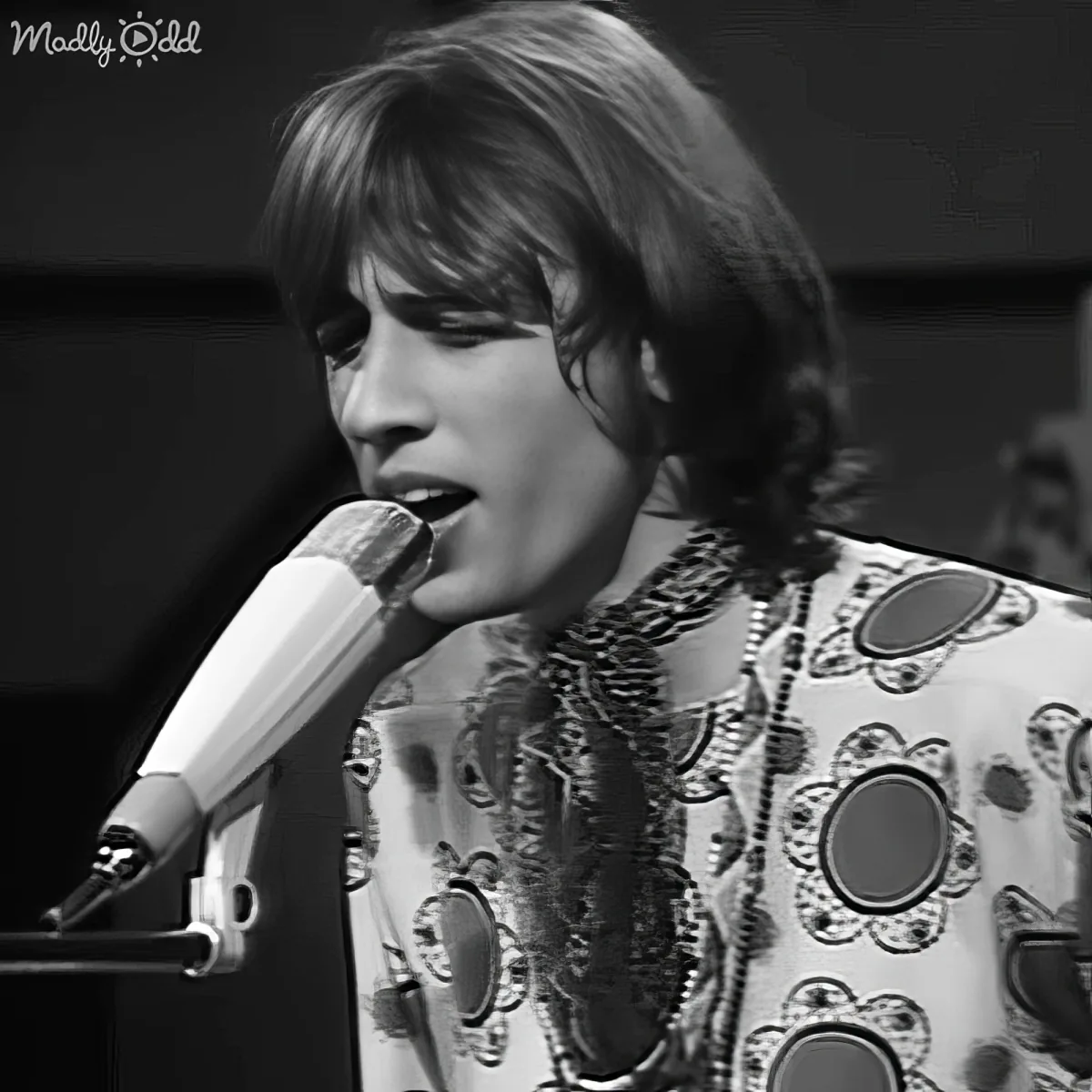 Close-up of the Bee Gees singing