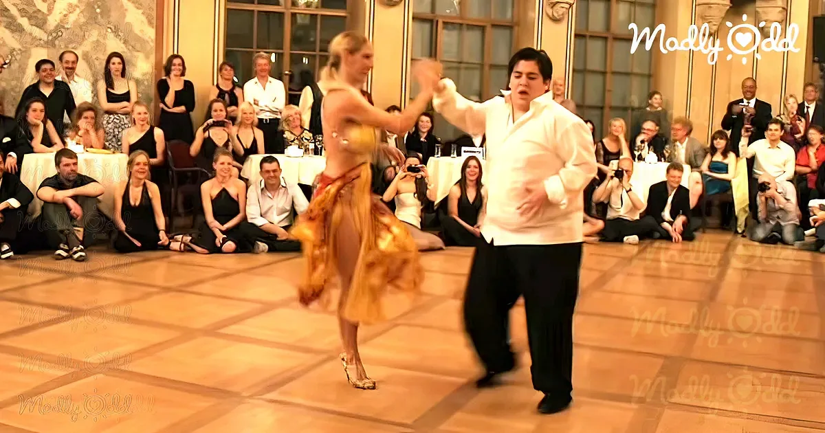 Big Guy's Earth-Shattering Dance Moves Leave the Crowd Panting