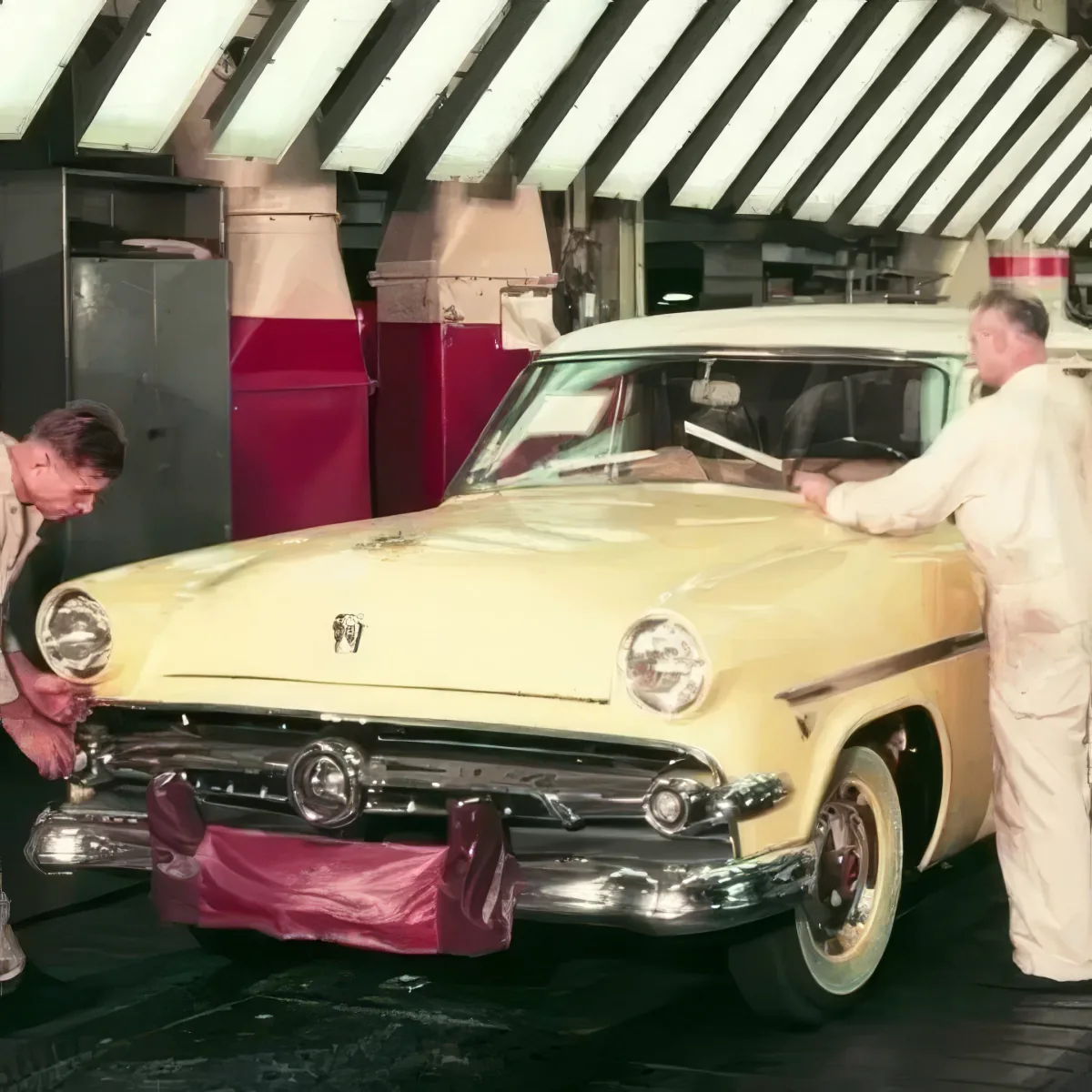 1950s cars on display, shiny and stylish, people admiring the vintage designs.