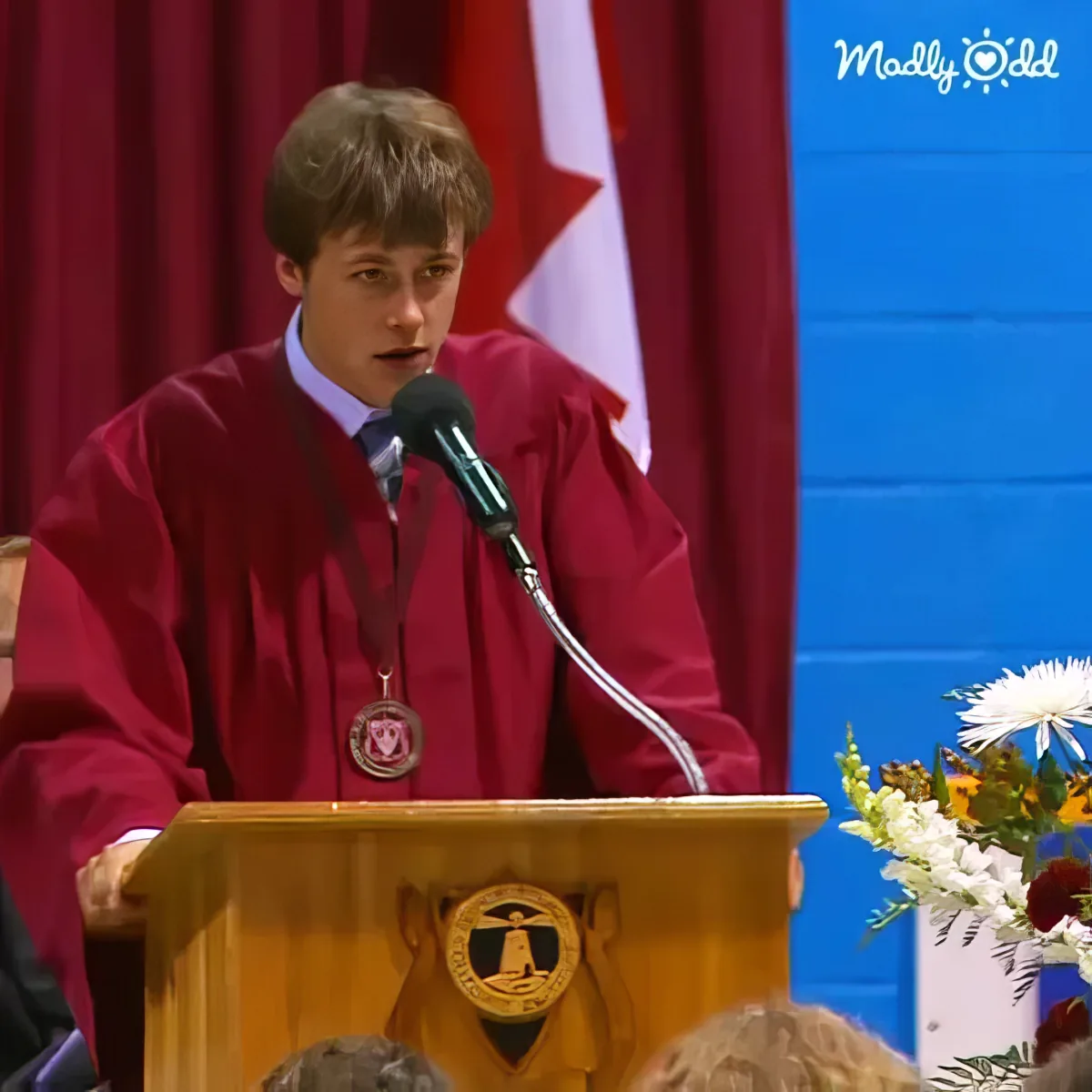 Valedictorian gives speech, then drops mic, classmates cheering wildly.