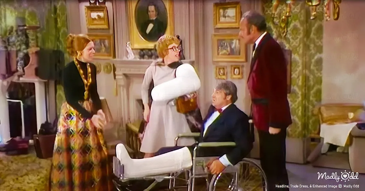 A woman in a floral dress interacts with others in a room with vintage decor and framed portraits.