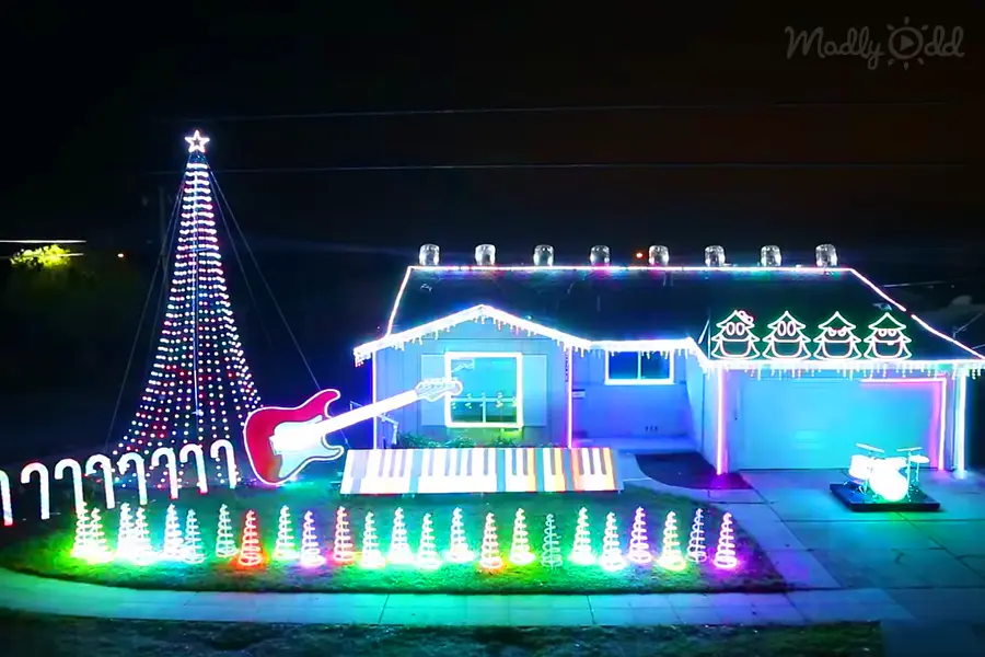 Star Wars Christmas Light Show, - house light up in blue and rainbow candy canes