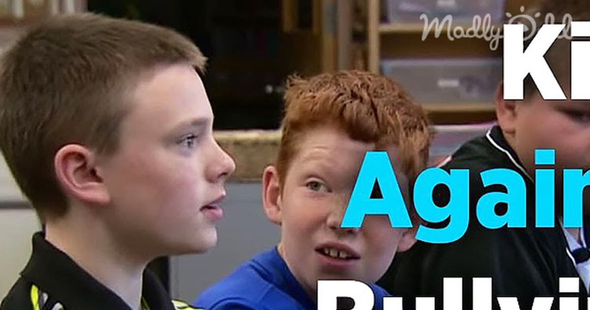 A boy in a striped shirt is being bullied at school, but another kid stands up for him.